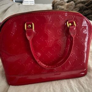 LV red purse. Used once